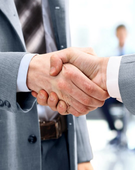 Close up of businessmen shaking hands
